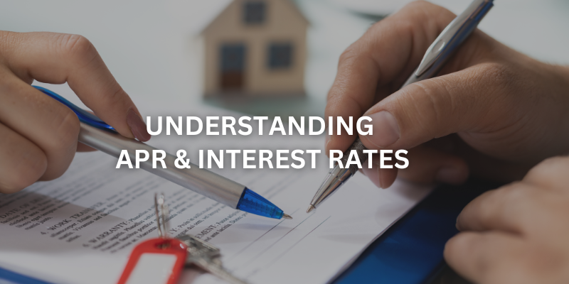 Person analyzing loan documents, understanding APR and interest rates for smart financial decisions